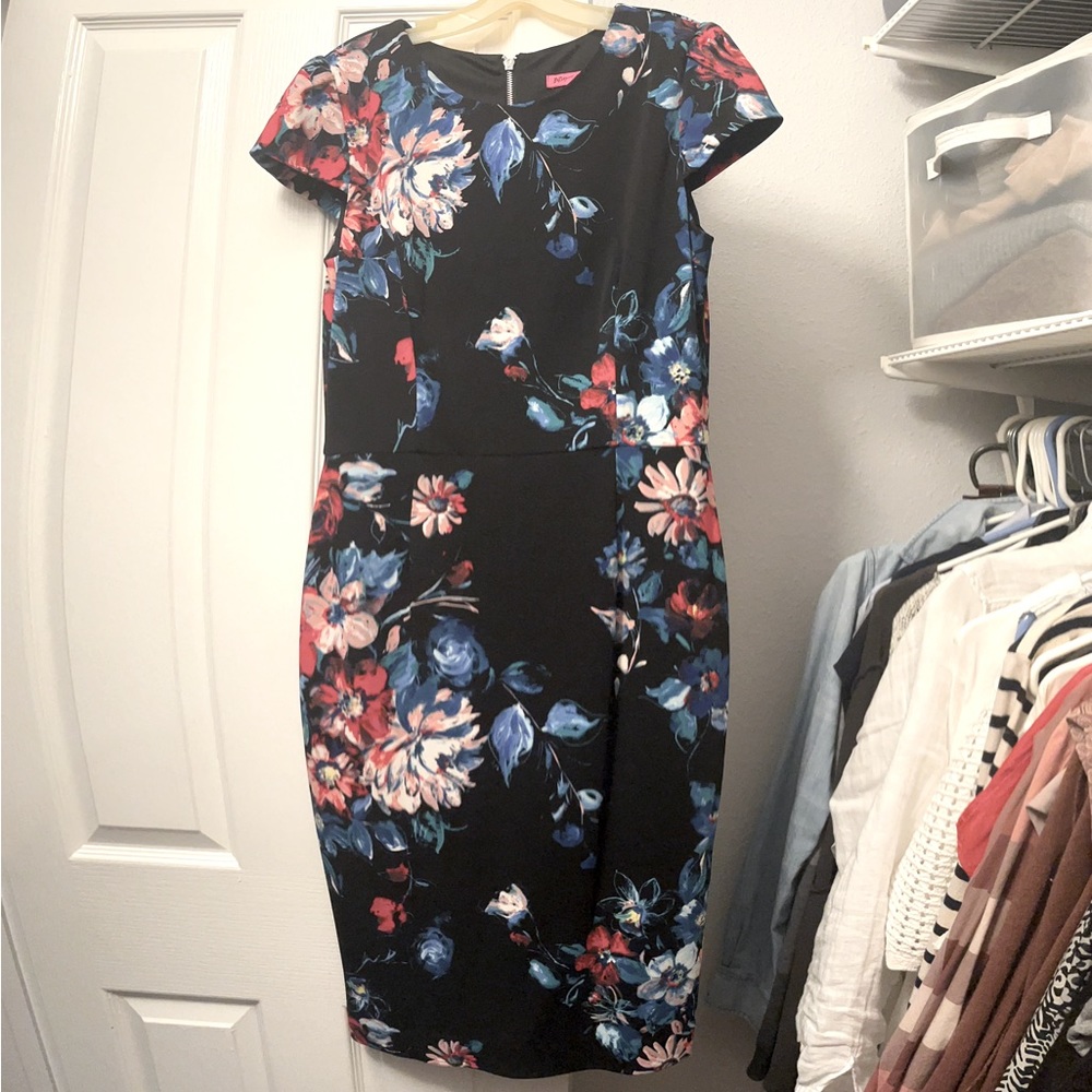 Betsey Johnson black floral dress. Stylish and comfy midi style. Size 10.